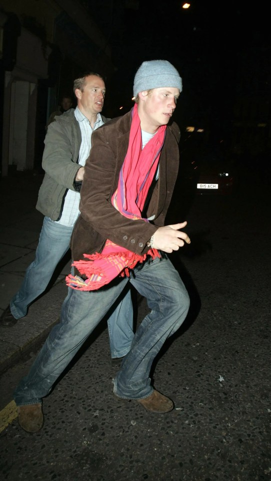 Prince Harry leaving a nightclub in London, accompanied by friends.