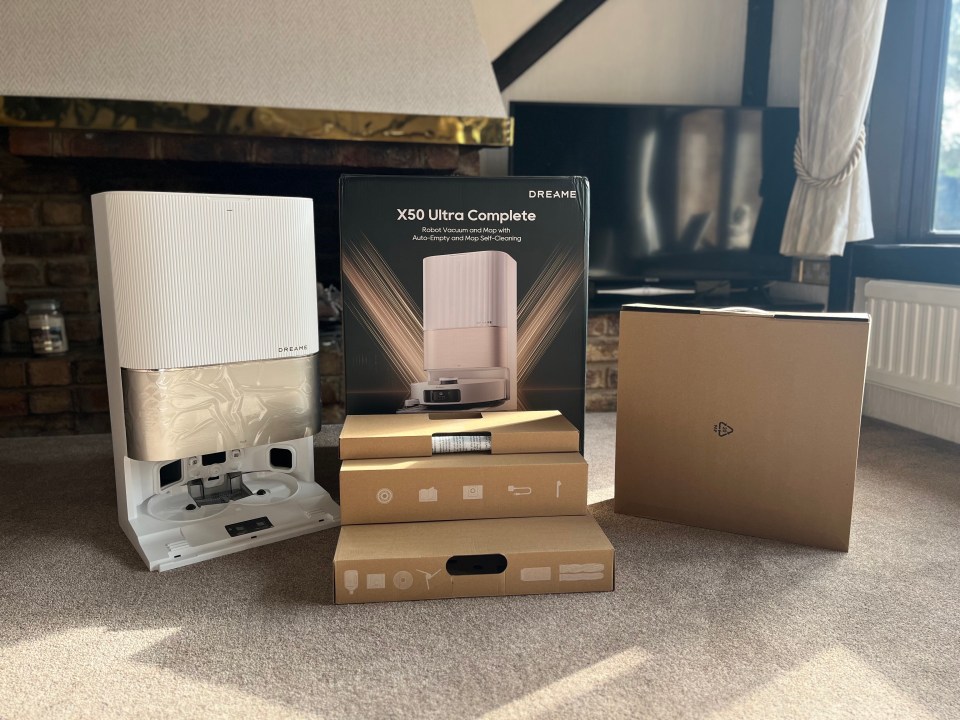 Dreame X50 Ultra Complete robot vacuum and mop with auto-empty and mop self-cleaning, shown in its packaging.