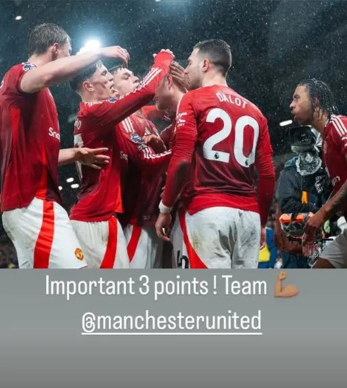 Manchester United players celebrating a victory.