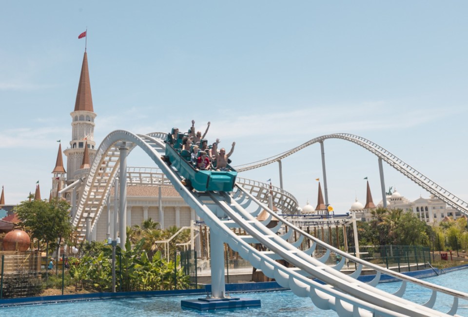 Roller coaster riders at The Land of Legends Theme Park.