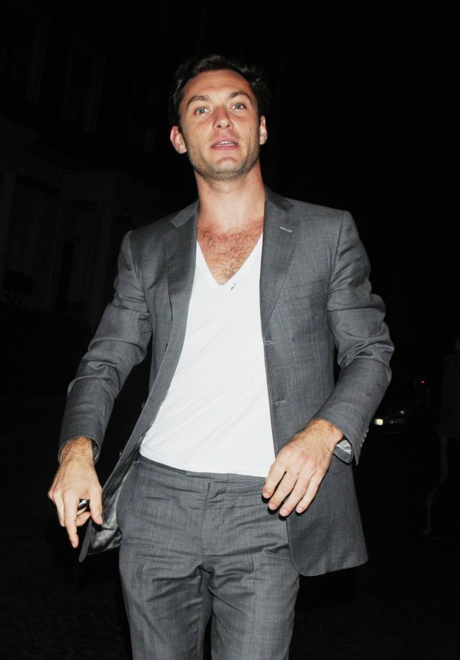Jude Law leaving a nightclub.