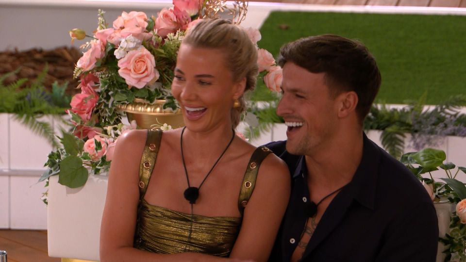 Grace Jackson and Luca Bish laughing on Love Island.