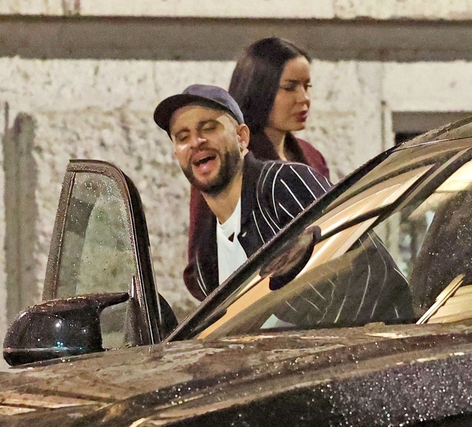 Kyle Walker getting into a car with two women.