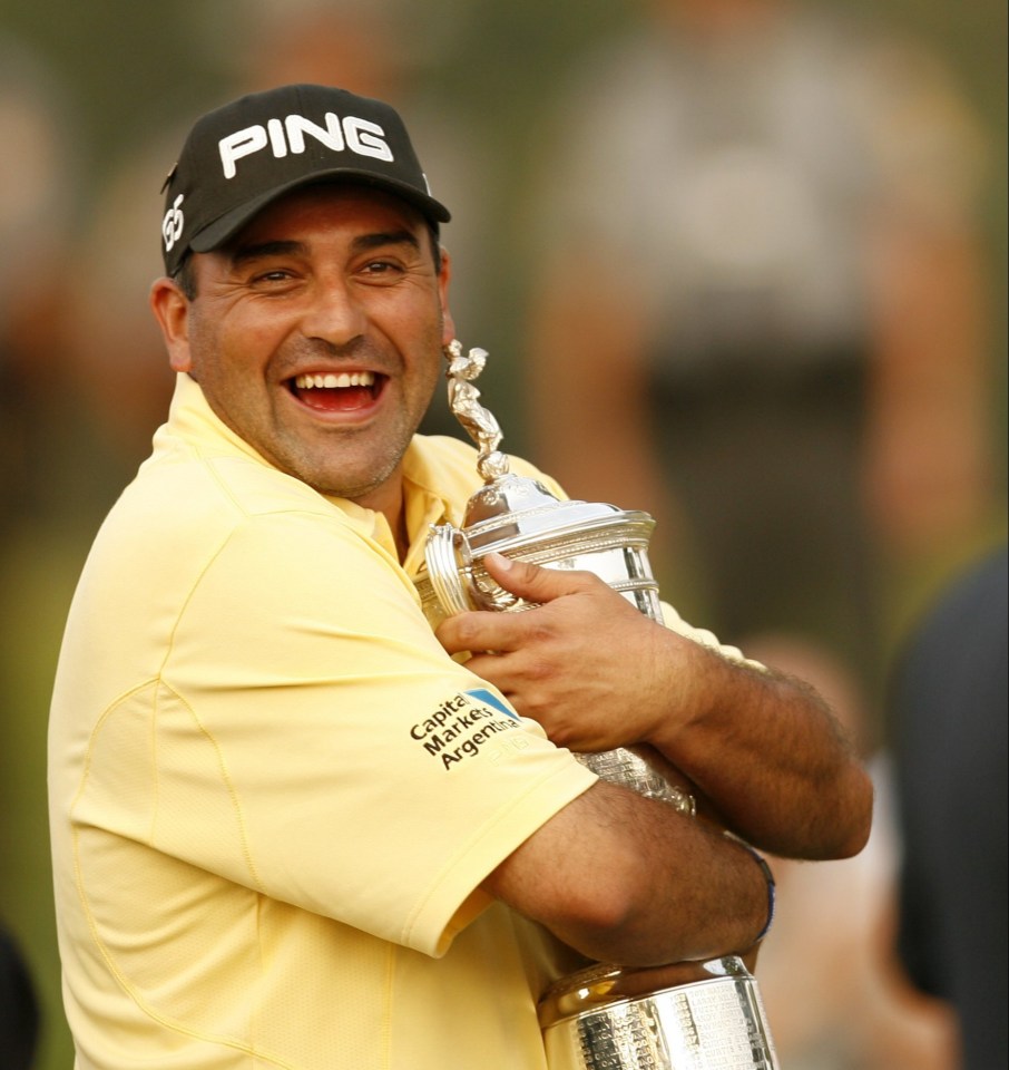 Angel Cabrera of Argentina hugging the U.S. Open Trophy.
