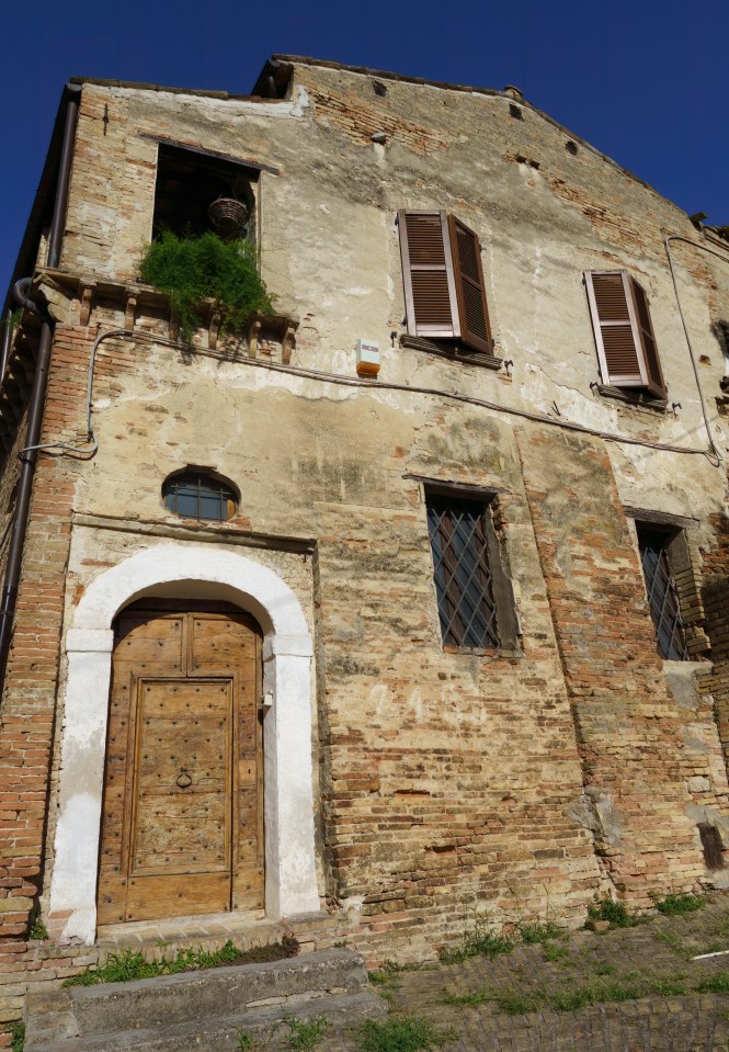 Old brick building in Penne, Italy.