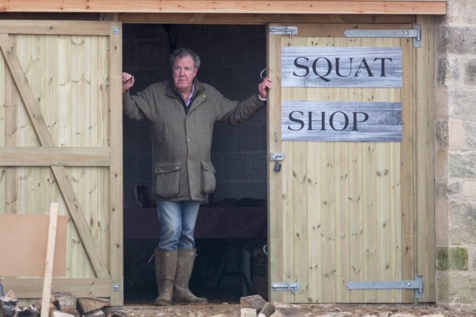 Jeremy Clarkson standing in the doorway of his Diddly Squat shop.