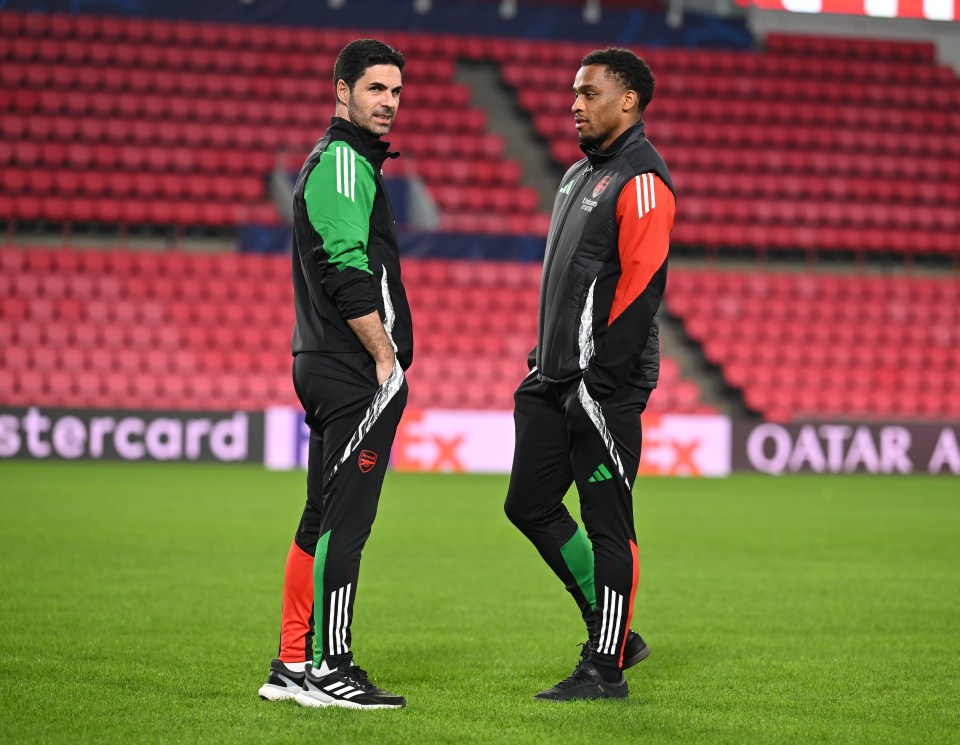 Mikel Arteta and Jurrien Timber at a press conference.