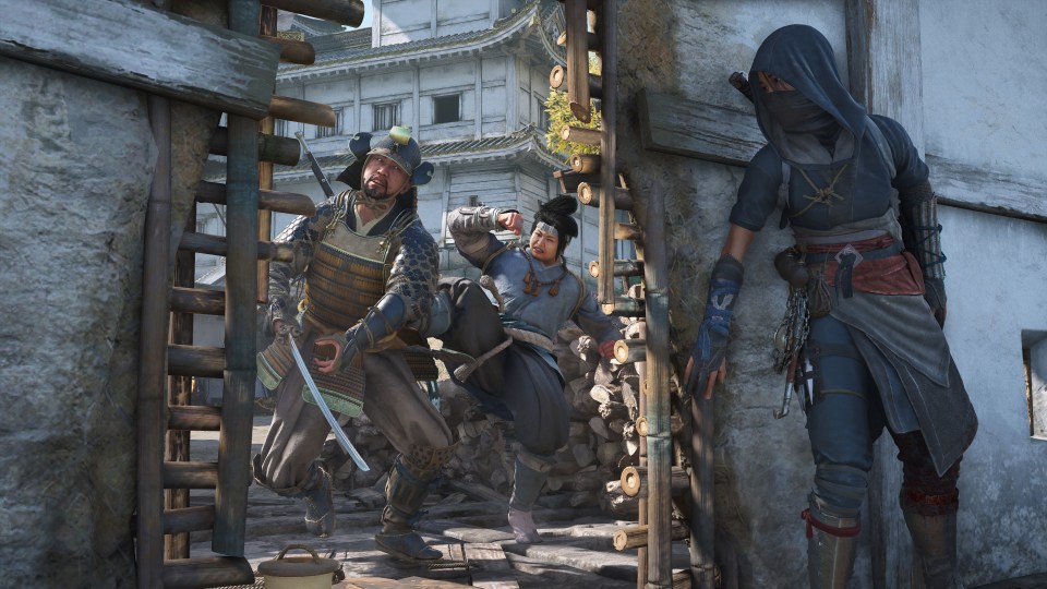 Screenshot of Assassin's Creed Shadows showing a samurai and another character fighting, while a hooded figure watches from a doorway.
