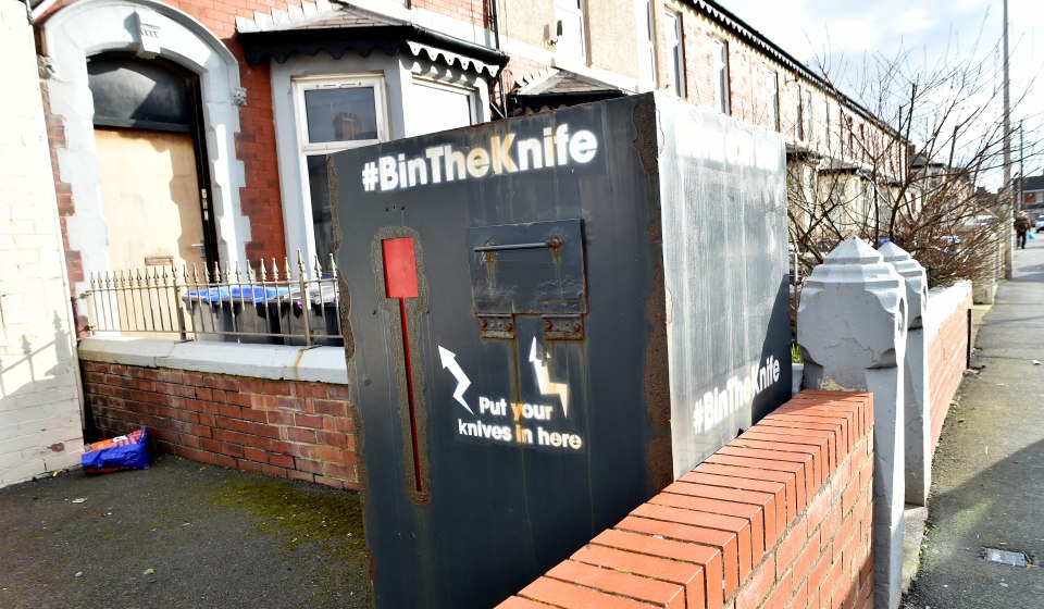 Knife disposal bin on a residential street.  #BinTheKnife.