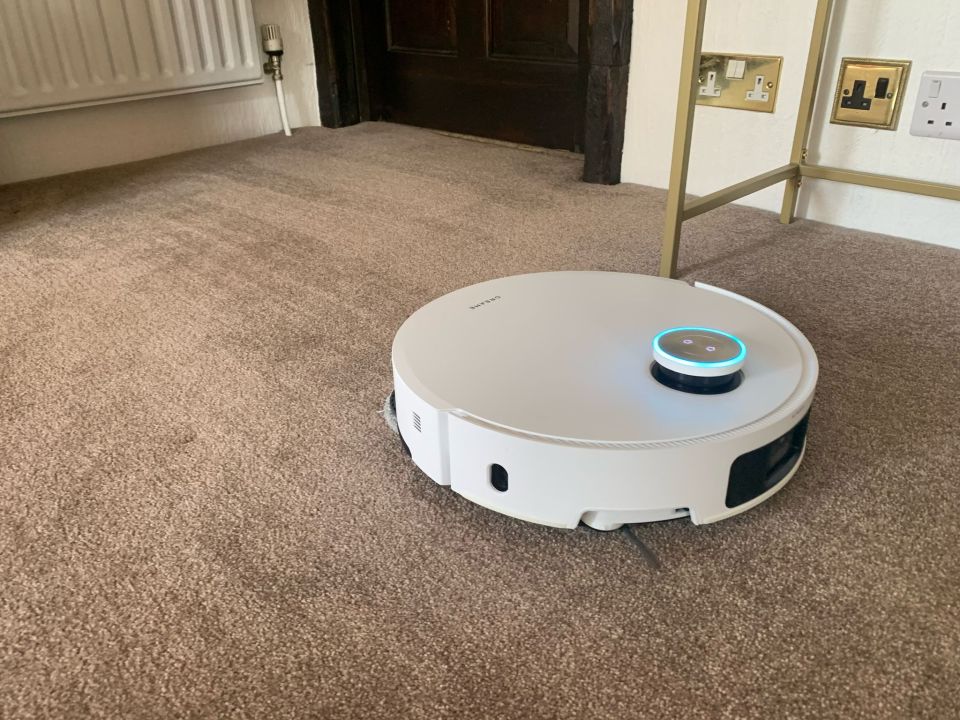 Dreame X50 Ultra robot vacuum cleaning carpet.