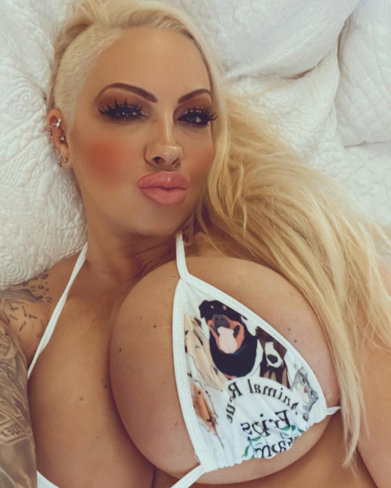 Close-up of a blonde woman wearing an animal print bikini top.