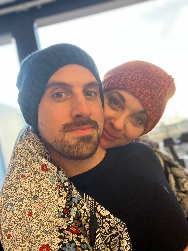 Couple embracing after hospital discharge.