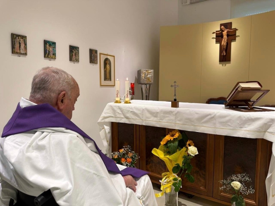 Pope Francis at mass in a chapel.