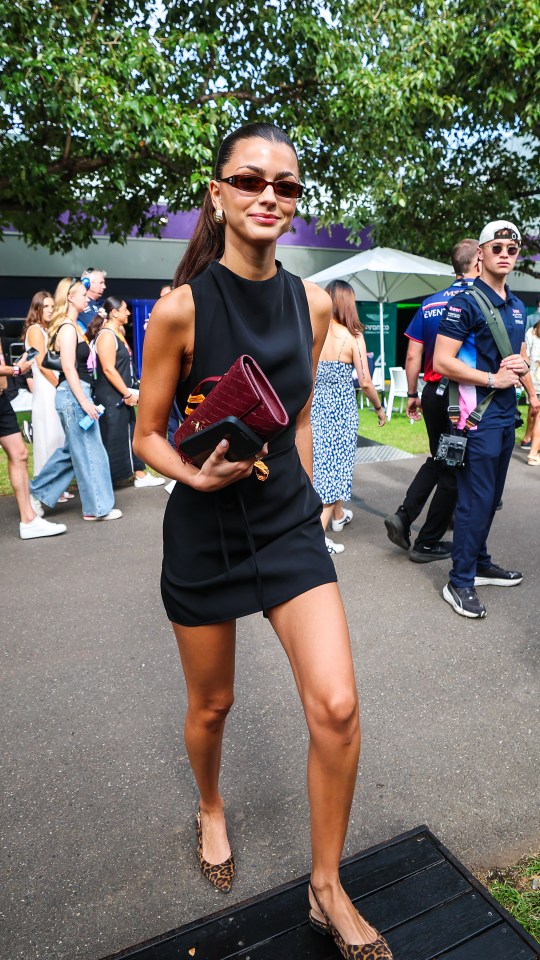 Francisca Gomes walking at the Australian Grand Prix.