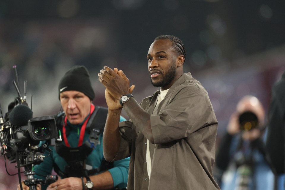 Michail Antonio applauding fans.