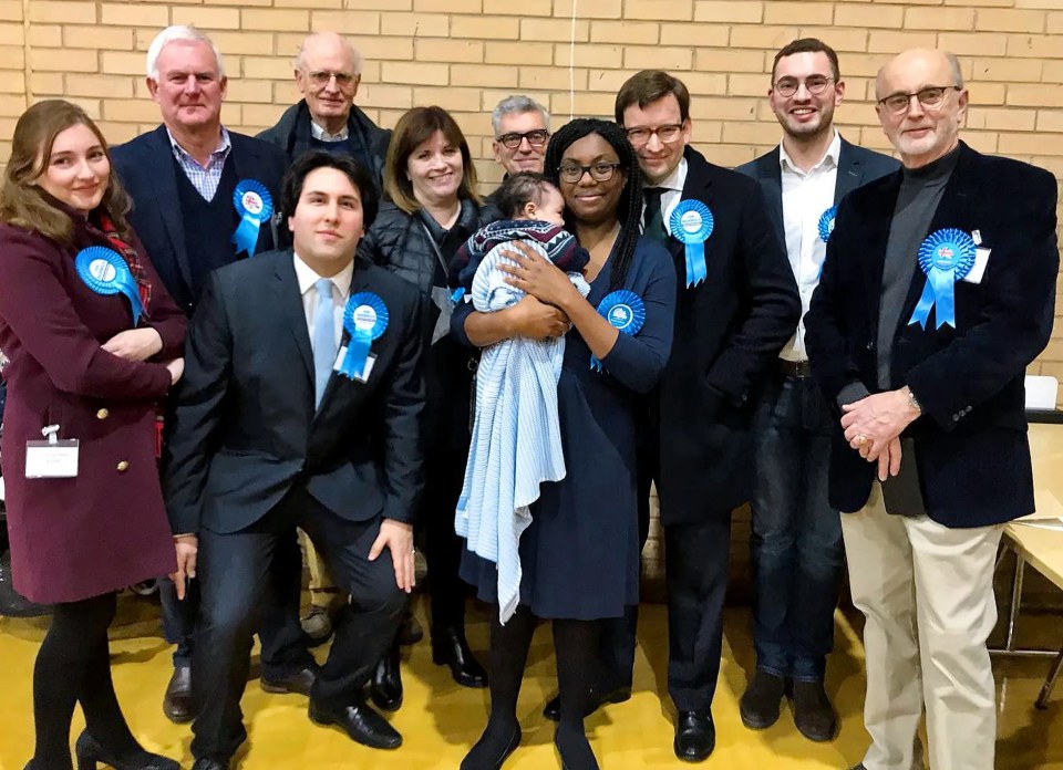 Group photo of a campaign team and supporters.
