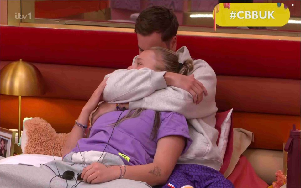 Chris Hughes and JoJo Siwa cuddling.
