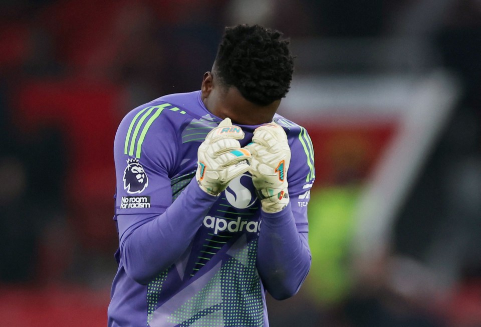 Andre Onana of Manchester United with his head down.