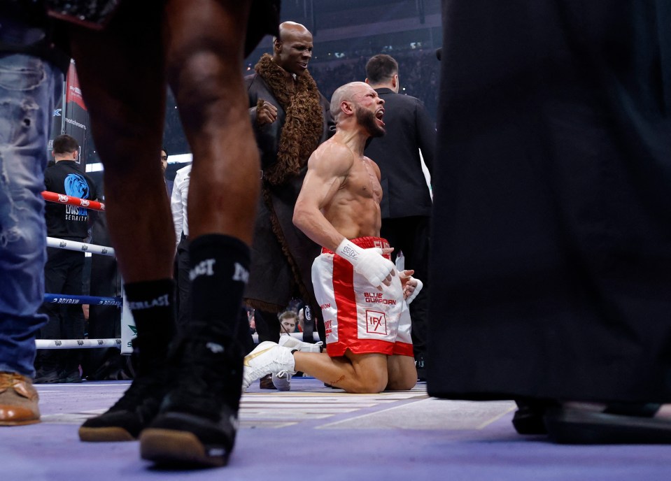 Chris Eubank Jr. celebrates after a boxing match victory.