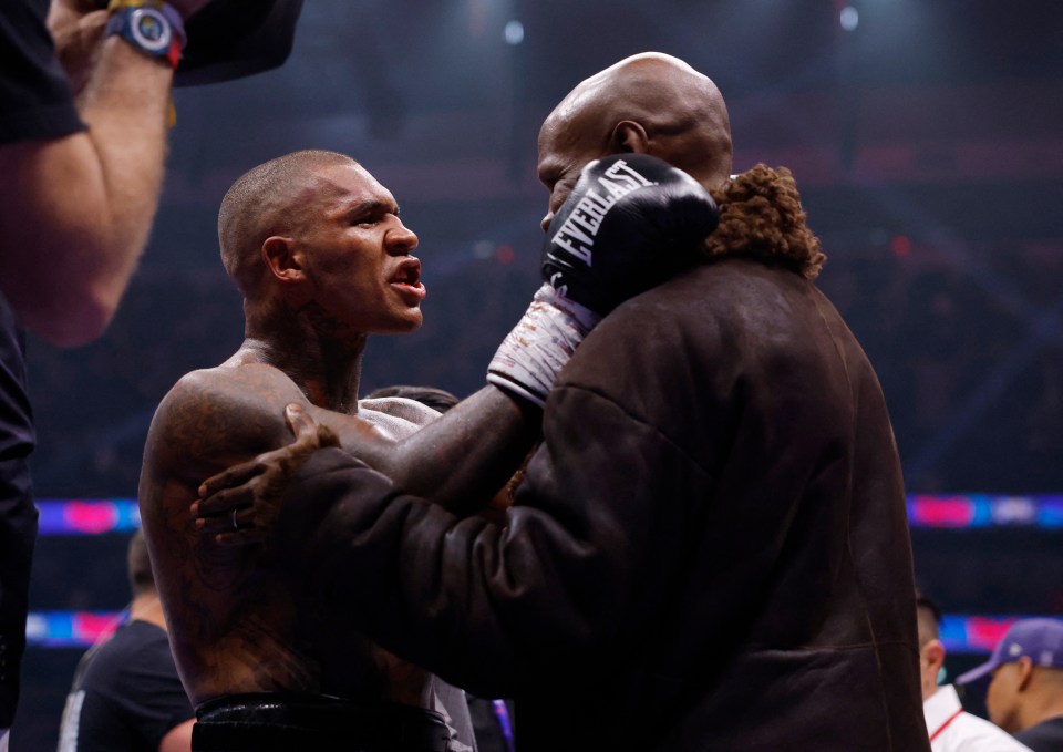 Conor Benn speaking with Chris Eubank Jr after a boxing match.