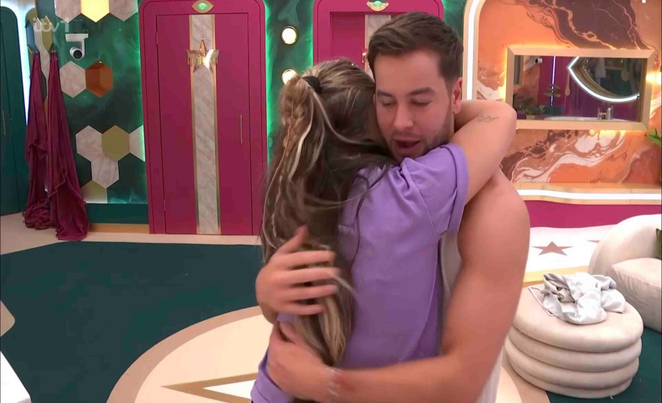 Chris Hughes comforting JoJo Siwa.