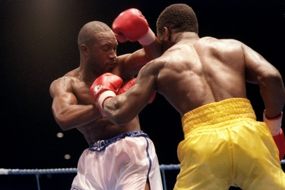 10 Sep 1993:  Nigel Benn and Chris Eubank trade blows during a bout. Mandatory Credit: Holly Stein  /Allsport