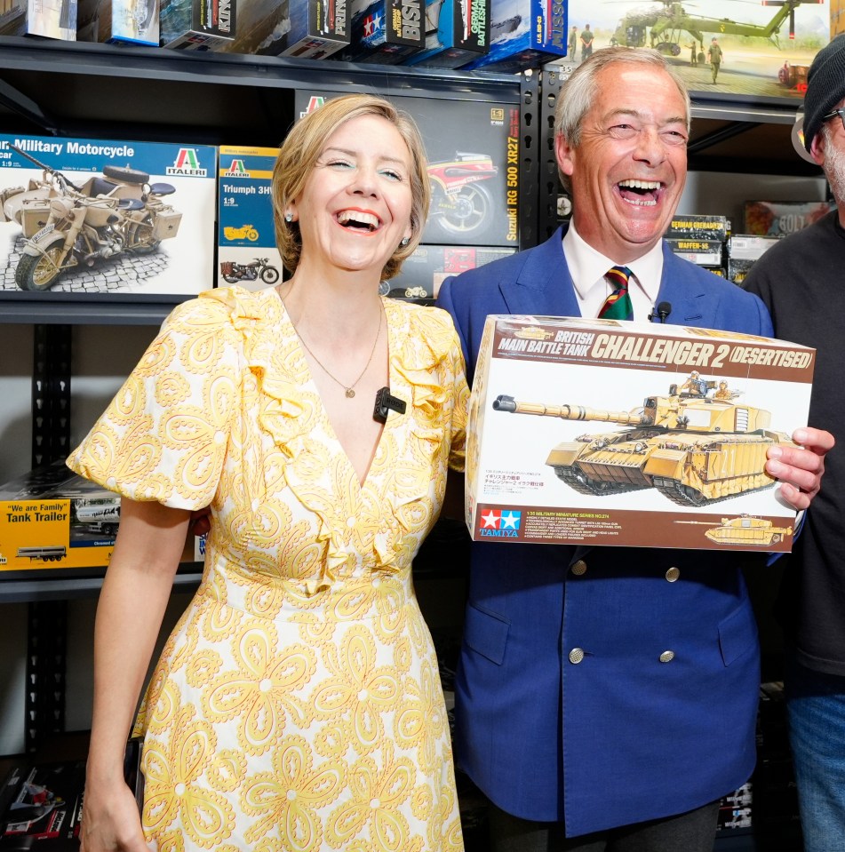 Nigel Farage and Andrea Jenkyns campaigning with a model tank.