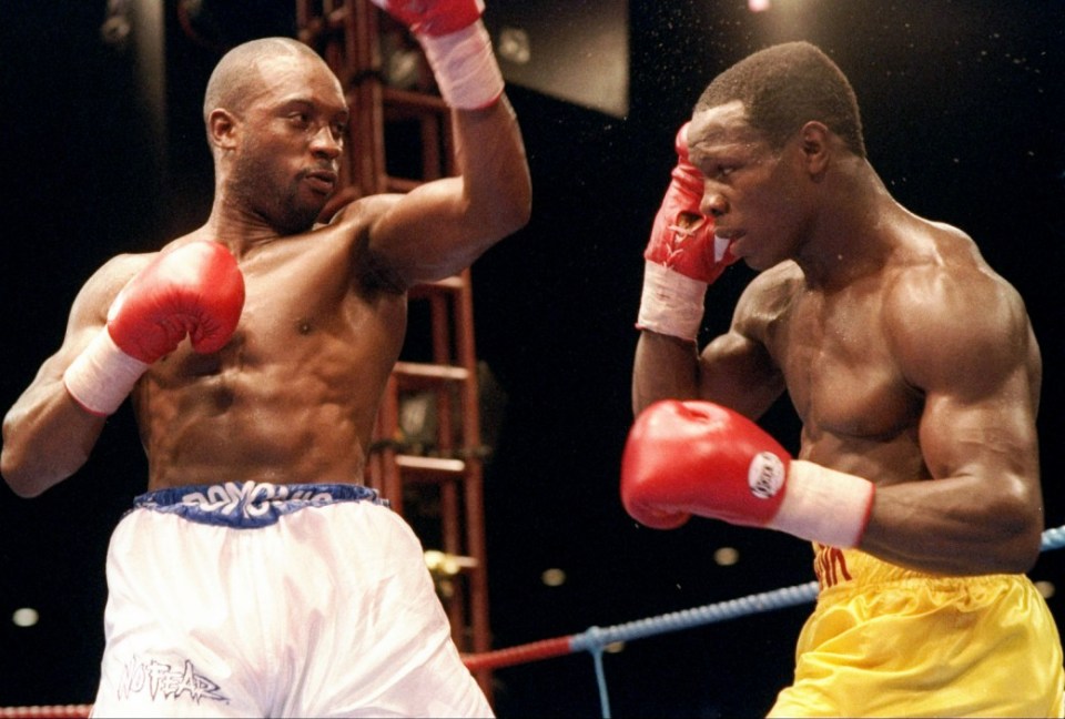 10 Sep 1993:  Nigel Benn and Chris Eubank trade blows during a bout. Mandatory Credit: Holly Stein  /Allsport