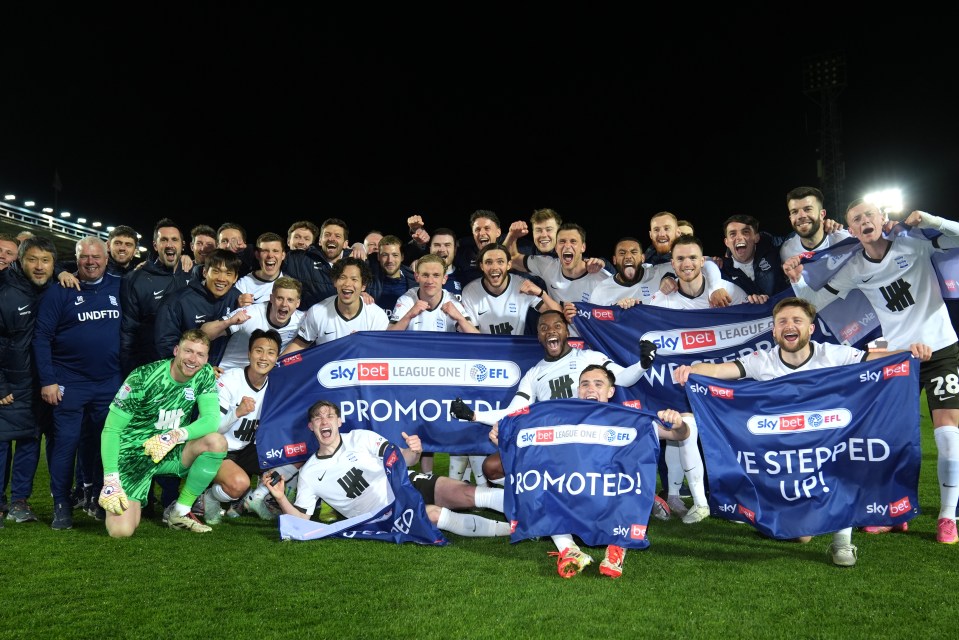 Birmingham City players celebrating promotion.