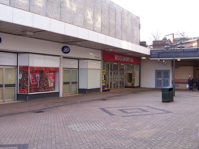 Boots and Woolworths stores in a shopping mall.