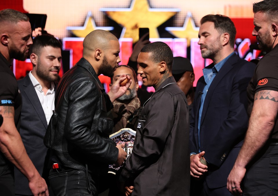 Chris Eubank Jr. and Conor Benn facing off at a press conference.