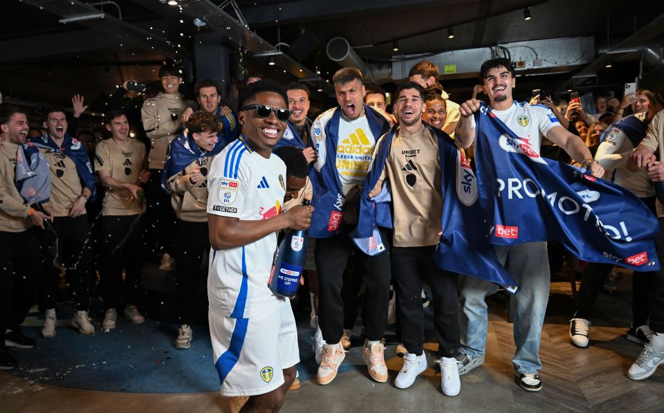 Leeds United players celebrating promotion.