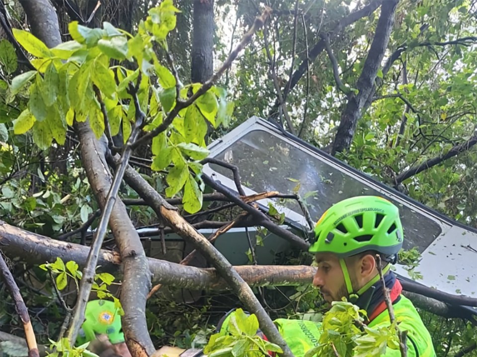 Rescuer at the site of a cable car accident.