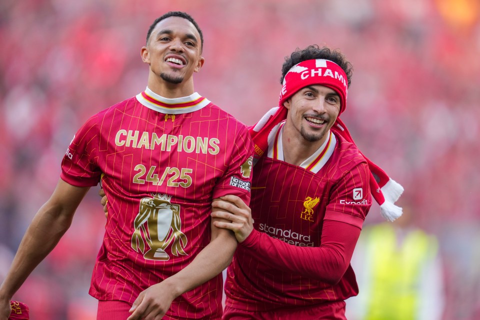 Liverpool's Cody Gakpo celebrates a goal, wearing a shirt that says "I Belong To Jesus."