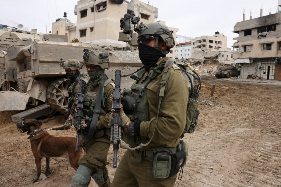 Israeli soldiers patrol Gaza City.
