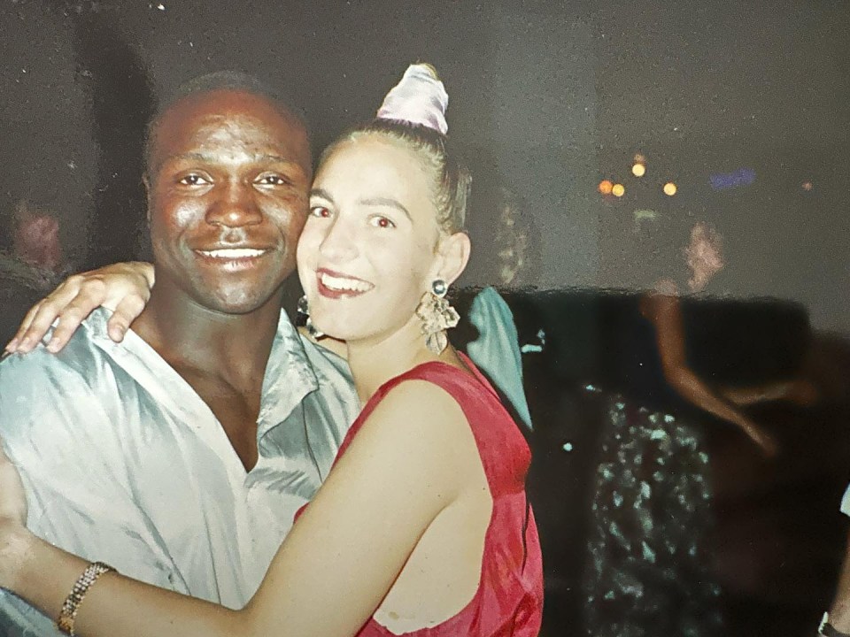 Photo of a man and woman embracing.