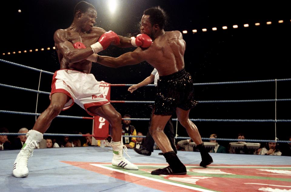 Chris Eubank and Nigel Benn boxing.
