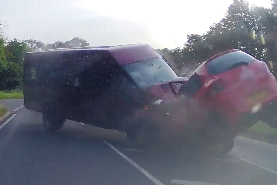 Minibus colliding with cars on a road.