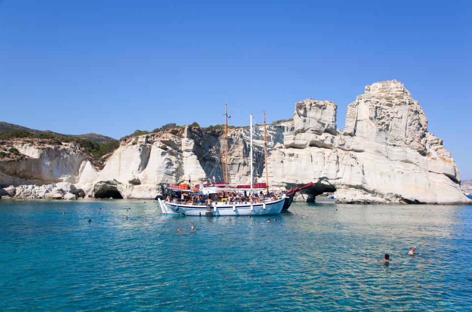 Tour boat in Kleftiko Bay, Milos Island.
