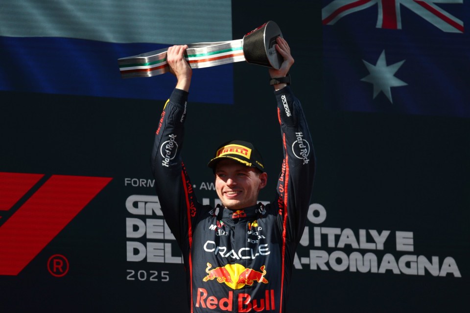IMOLA, ITALY - MAY 18: Race winner Max Verstappen of the Netherlands and Oracle Red Bull Racing celebrates on the podium during the F1 Grand Prix of Emilia-Romagna at Autodromo Internazionale Enzo e Dino Ferrari on May 18, 2025 in Imola, Italy. (Photo by Clive Rose/Getty Images)