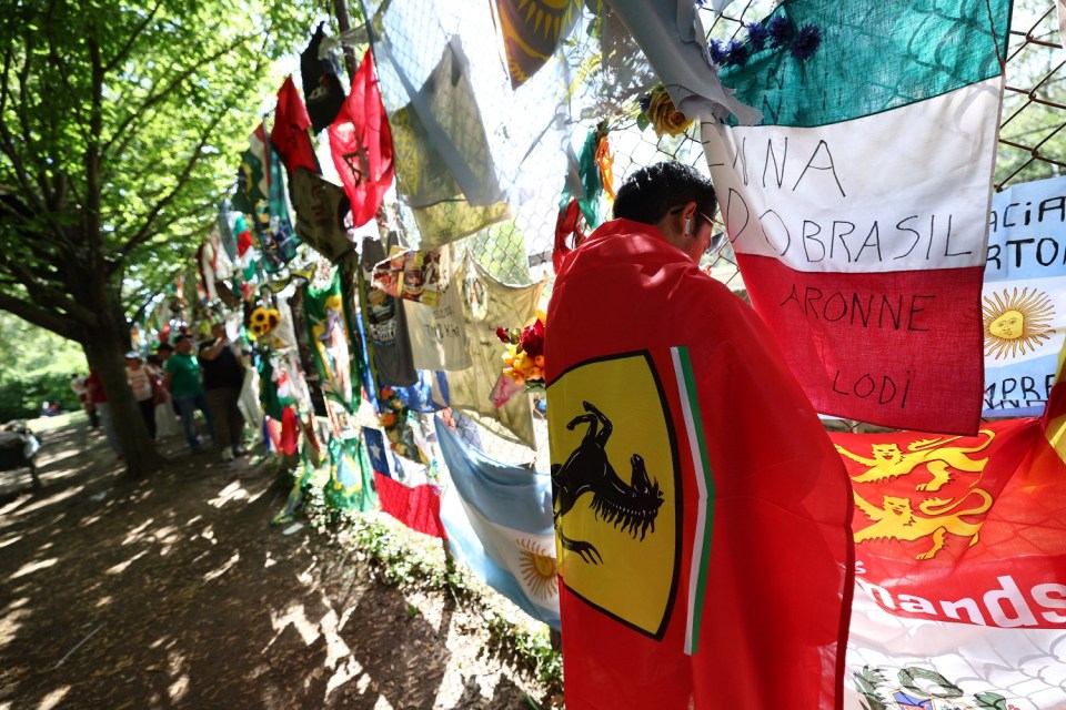 Formula One F1 - Emilia Romagna Grand Prix - Autodromo Enzo e Dino Ferrari, Imola, Italy - May 18, 2025 Ferrari fan is seen during the race REUTERS/Jakub Porzycki