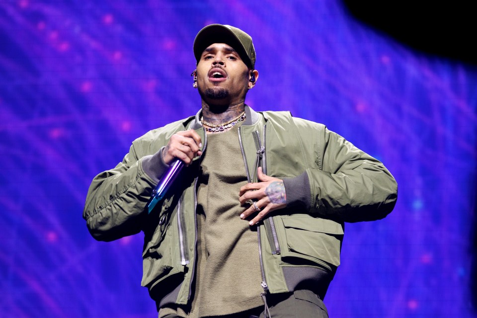 Chris Brown performing on stage.