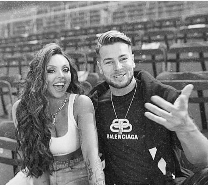 Black and white photo of Chris Hughes and Jesy Nelson.
