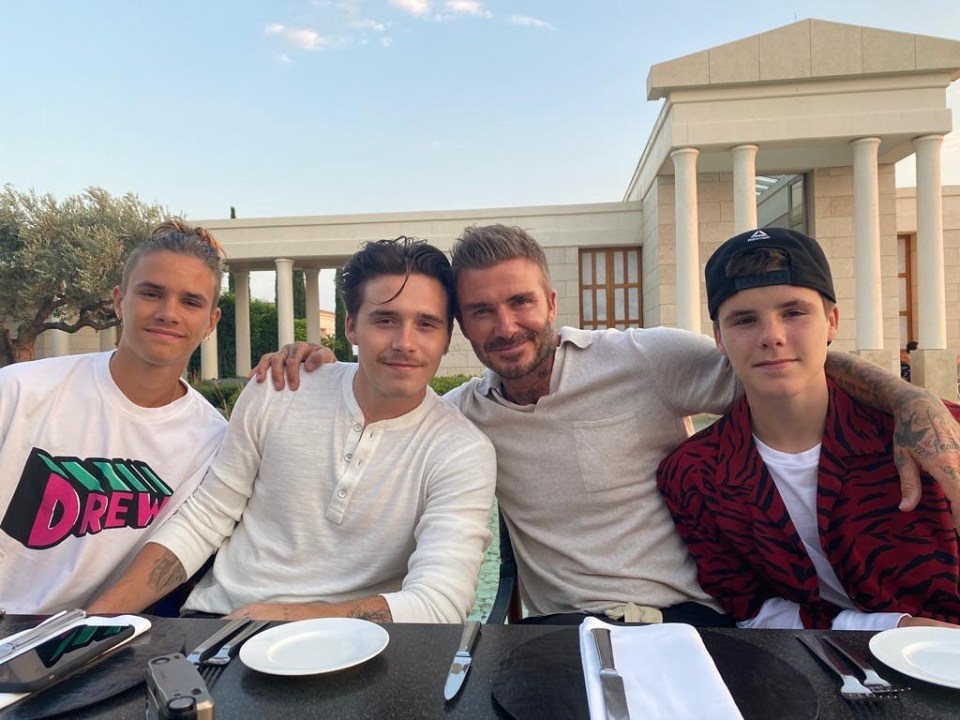 David Beckham with his three sons, Romeo, Brooklyn, and Cruz.