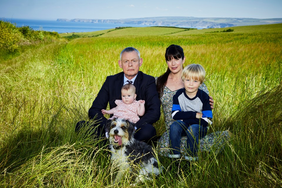 DOC MARTIN LAST SERIES EPISODE 4 Pictured:MARTIN CLUNES as Doc Martin,CAROLINE CATZ as Louisa Ellongham and their children This image is under copyright and can only be reproduced for editorial purposes in your print or online publication. This image cannot be syndicated to any other third party. For further information please contact: Patrick.smith@itv.com 07909906963