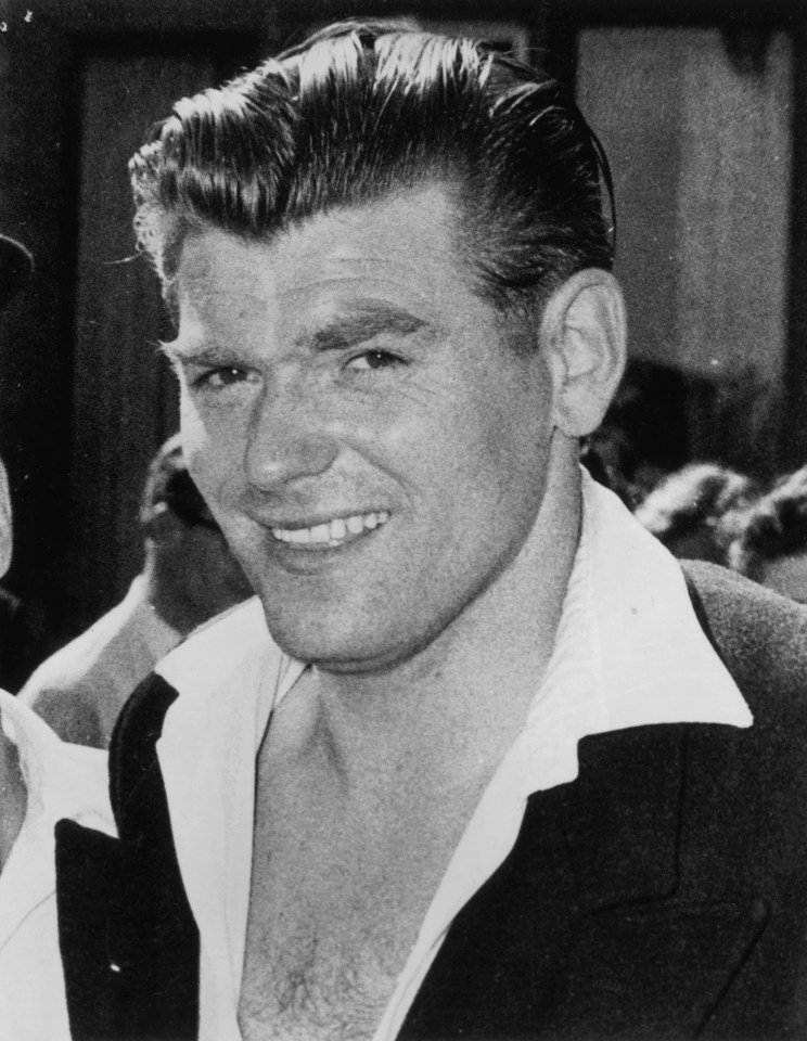 Black and white photo of Frank Mitchell, the "Mad Axeman," after his arrest.