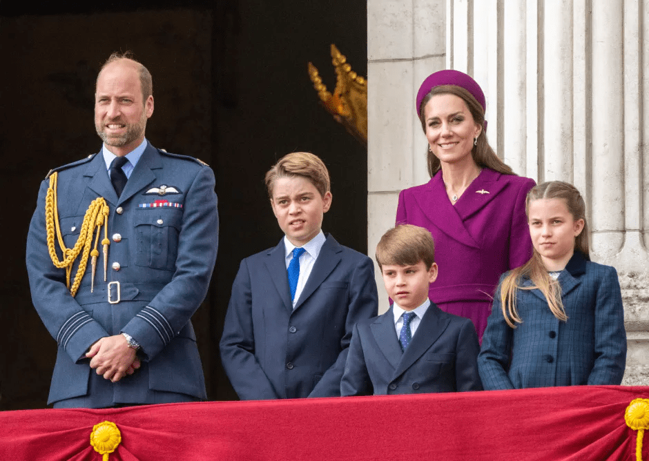 Prince William, Kate Middleton, Prince George, Prince Louis, and Princess Charlotte on a balcony.