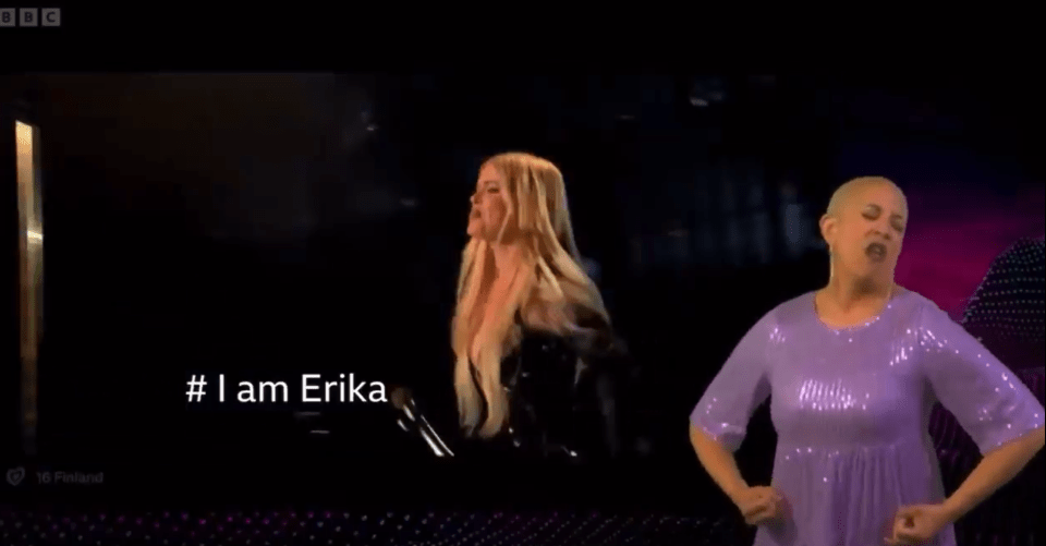 Two women lip-syncing to "#I am Erika".