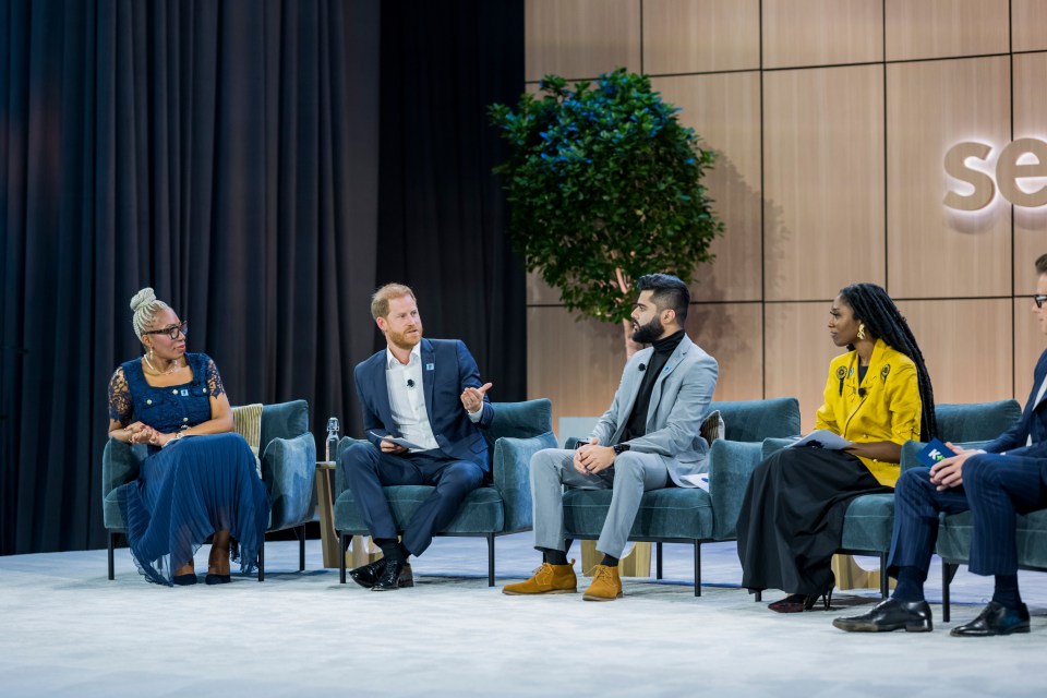 Prince Harry and other panelists at a discussion on youth leadership.