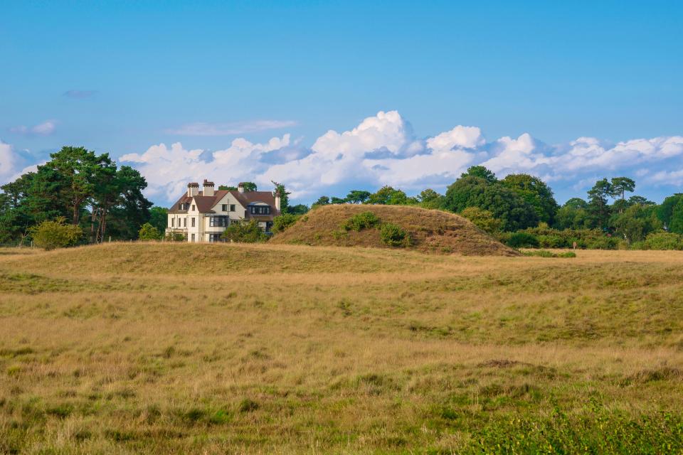 View of an Anglo-Saxon burial mound at Sutton Hoo, England.